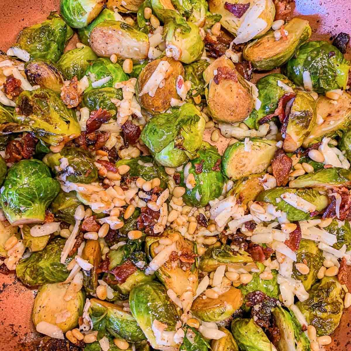 cheesy Brussels sprouts in a pan.