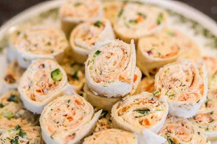smokes salmon pinwheels on a plate.