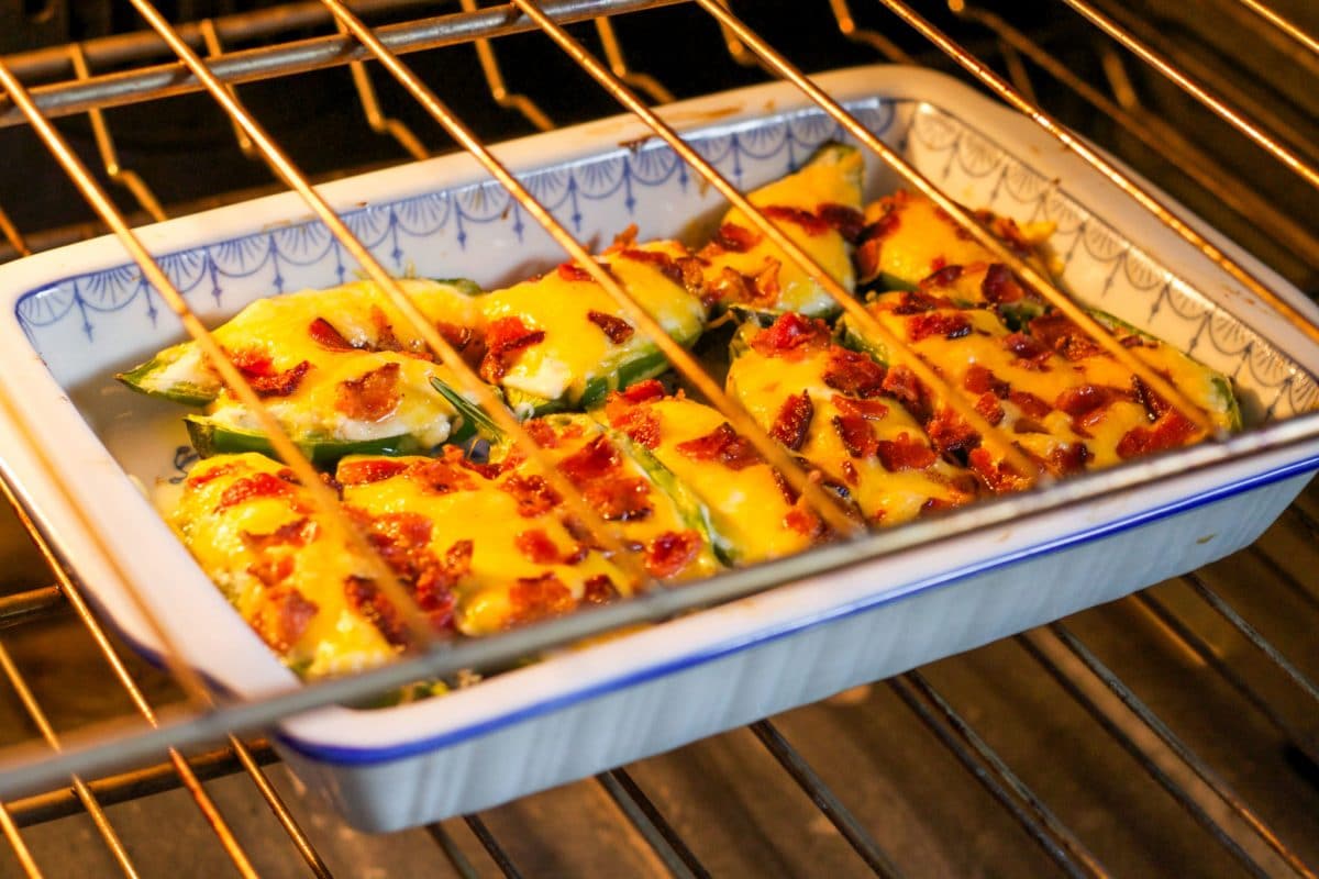 jalapeno poppers baking in the oven