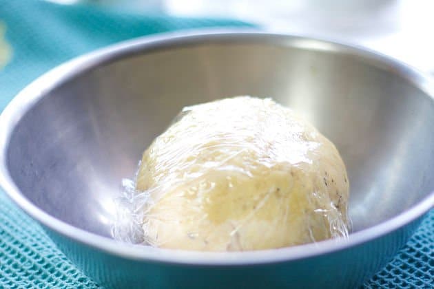 dough wrapped in Saran Wrap