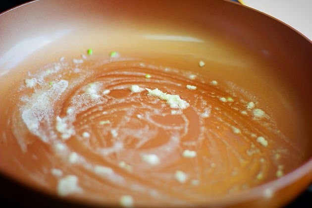 sautéed garlic in a pan
