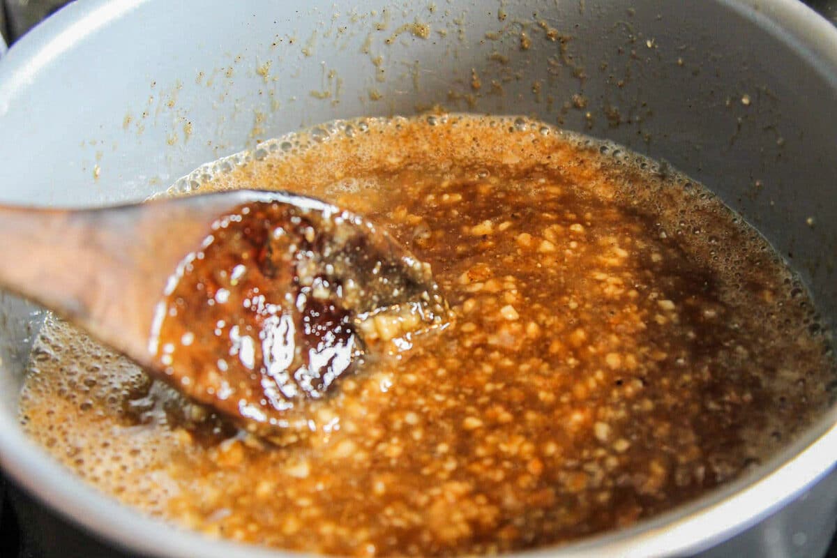 toffee being stirred in a pot