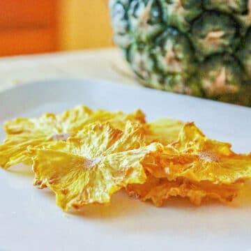 pineapple chips on a white plate