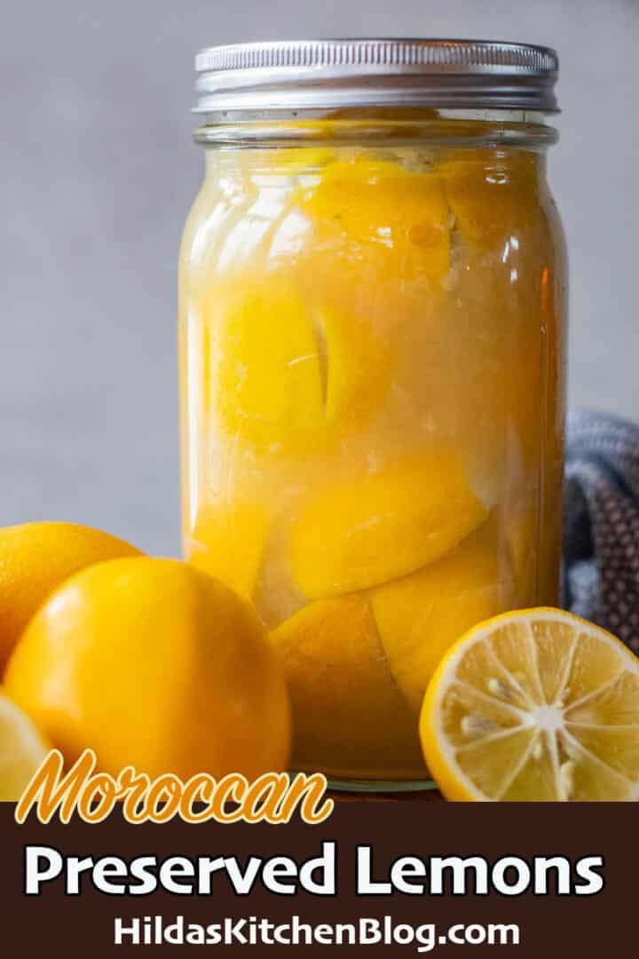 moroccan preserved lemons in a jar with more lemons around it