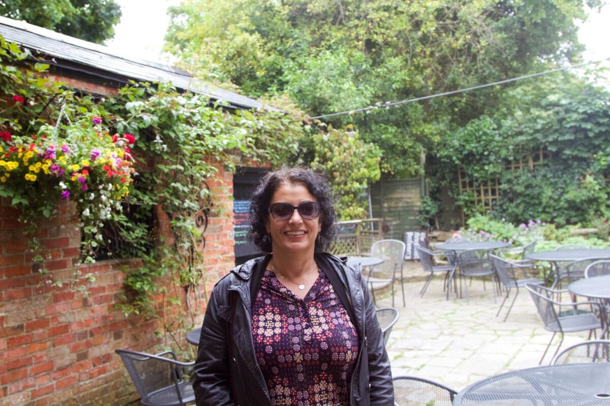 Hilda standing in a garden