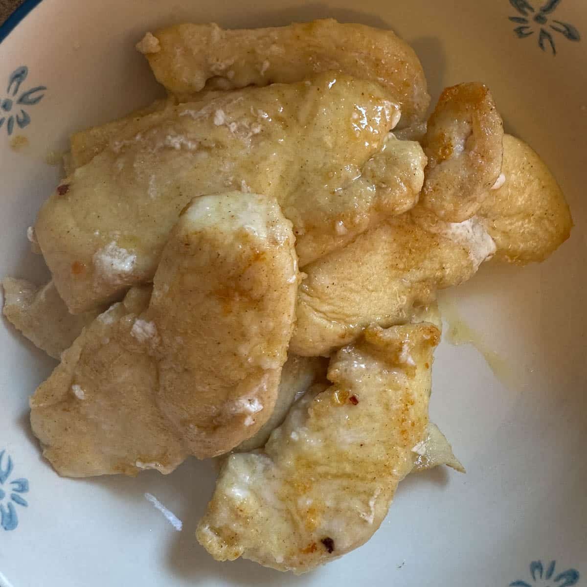 cooked chicken cutlets in a bowl