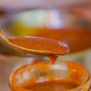enchilada sauce in a spoon