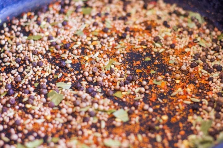 spices in a cast iron pan