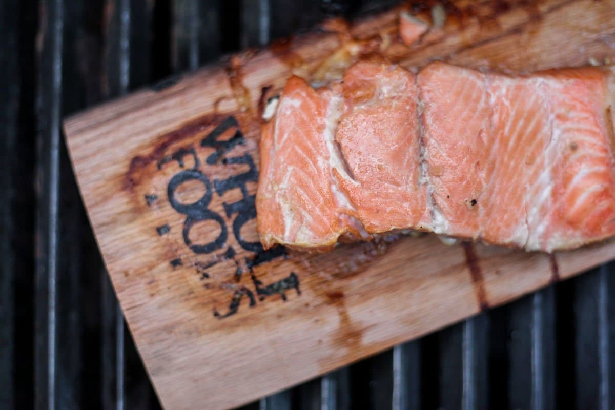 smoked salmon on a wooden slab