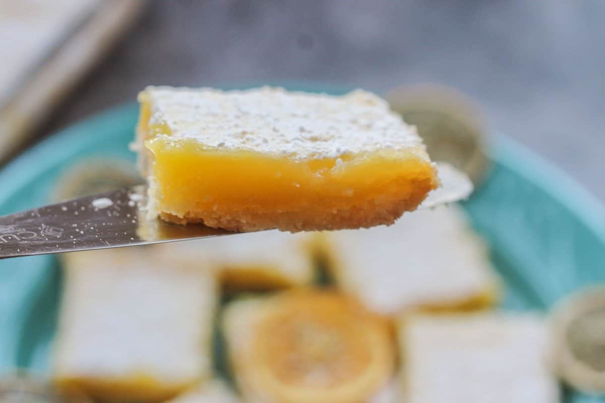 lemon bars being dished out