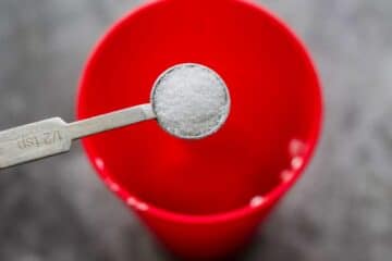 salt being added to a large red cup