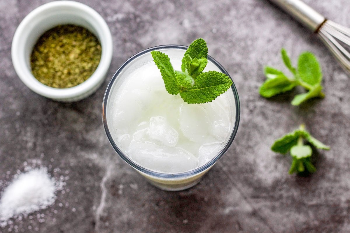 yogurt drink in a glass with mint