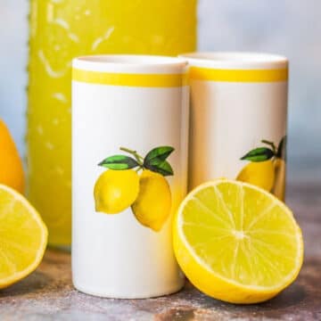 limoncello with 2 shot glasses and lemons