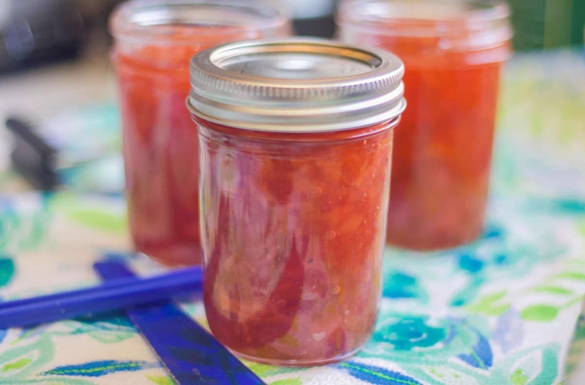 3 jars of jam on a dish towel