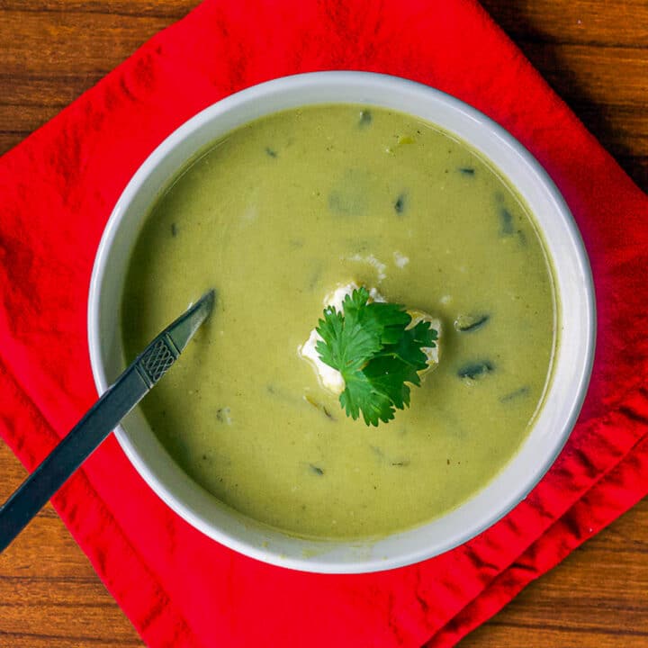 poblano soup on a red napkin