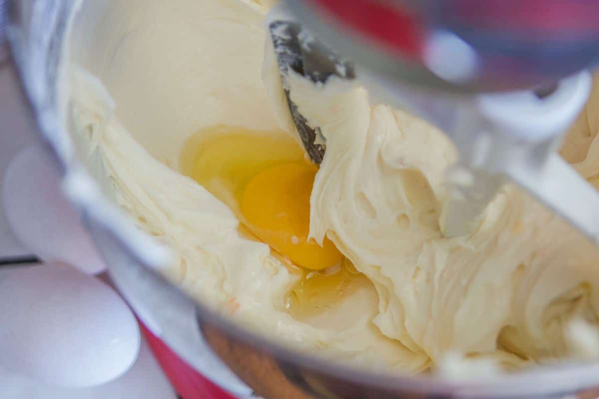 cream cheese and eggs in a mixer