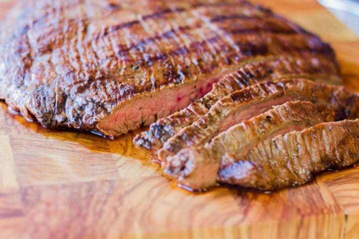 sliced beef on a cutting board