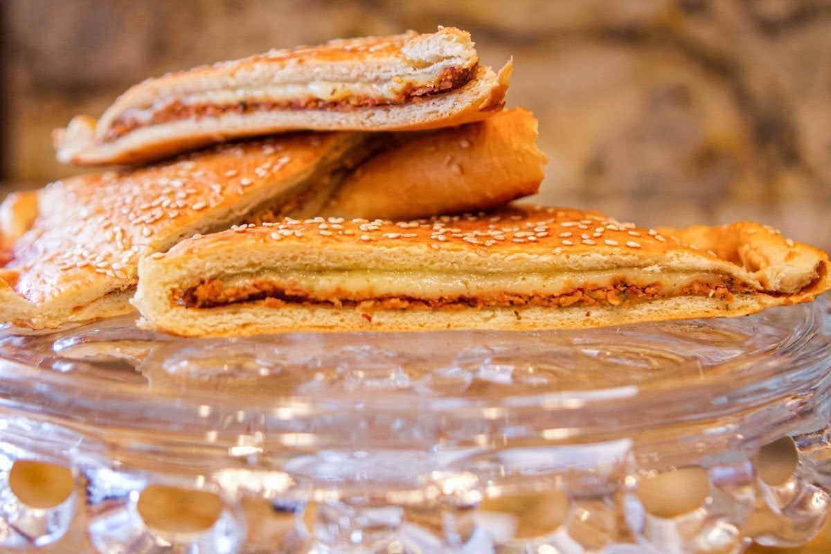 bean pie sliced into portions and stacked on eachother.