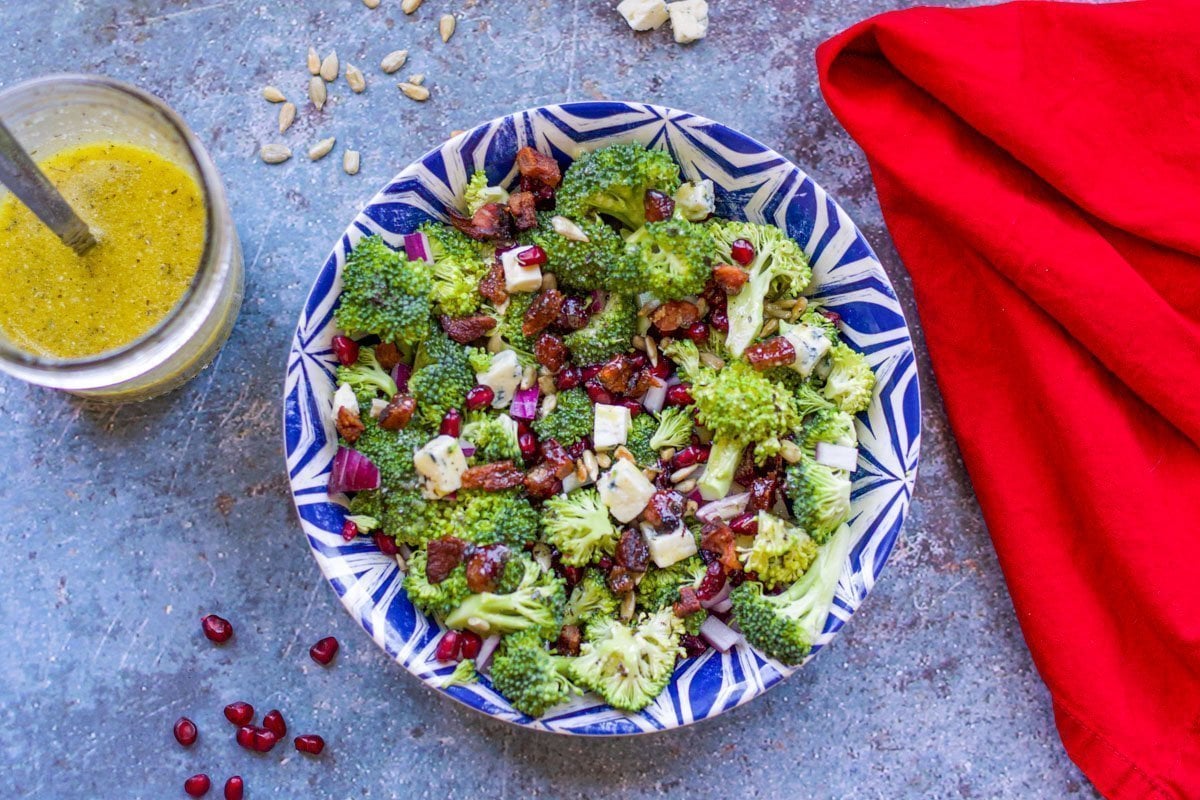 broccoli crunch salad with dressing and red napkin