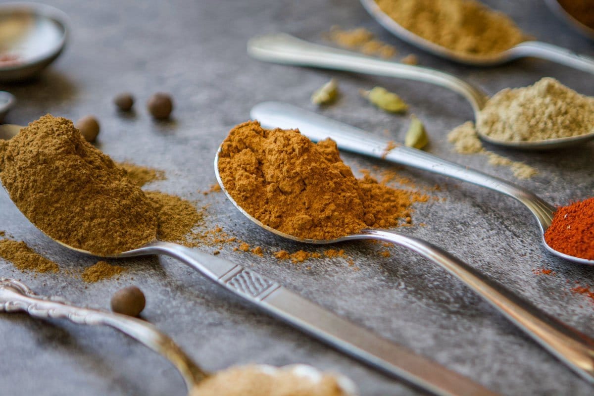 spoons with spices in them