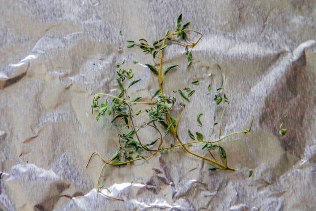 thyme being dried on foil