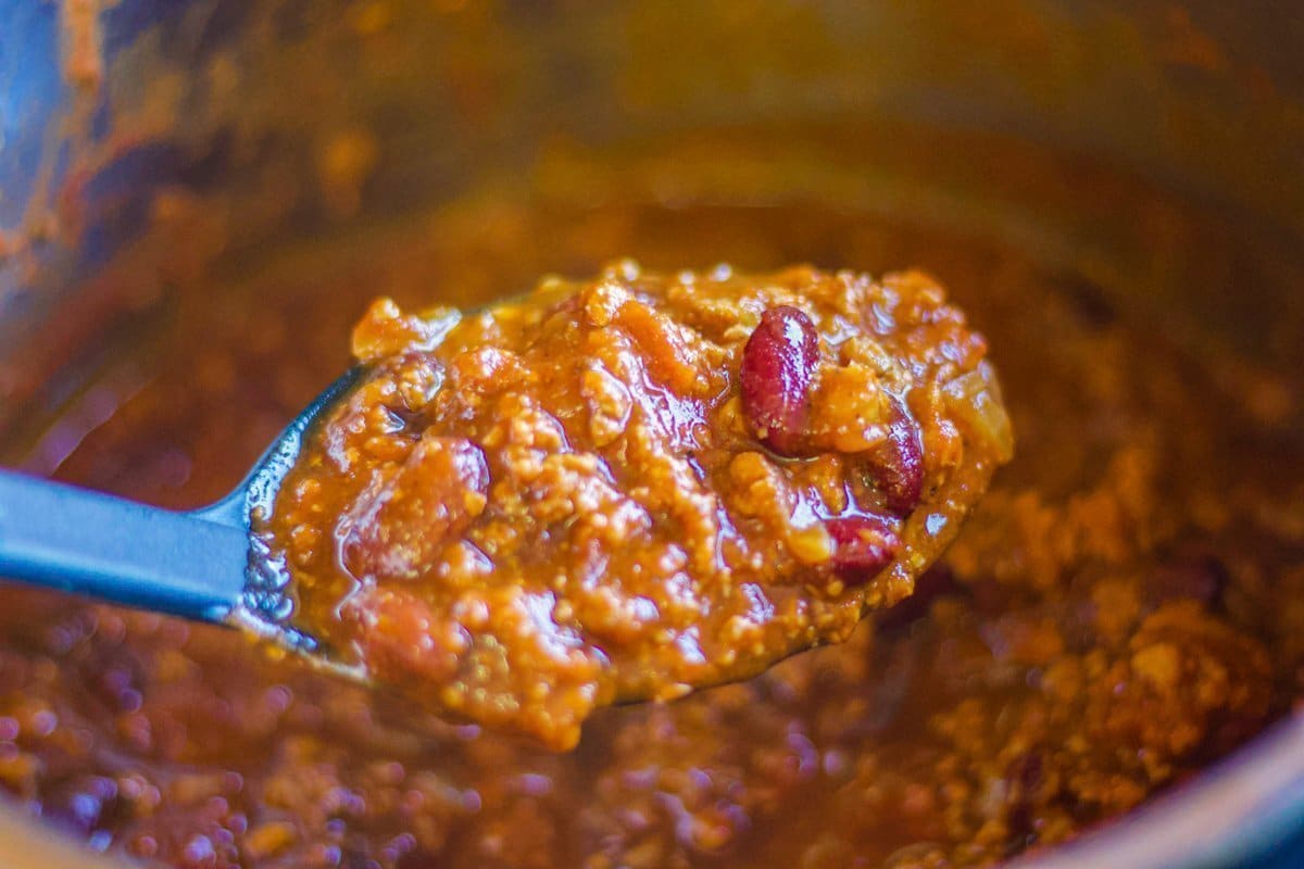 thick chili in spoon