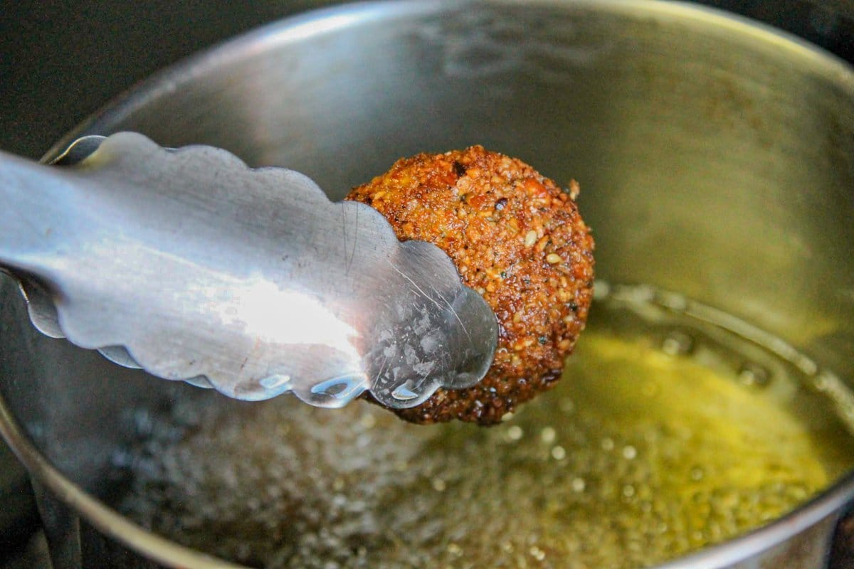 falafel being removed from hot oil