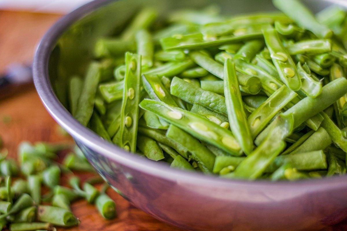 trimmed and sliced green beans in a bowl