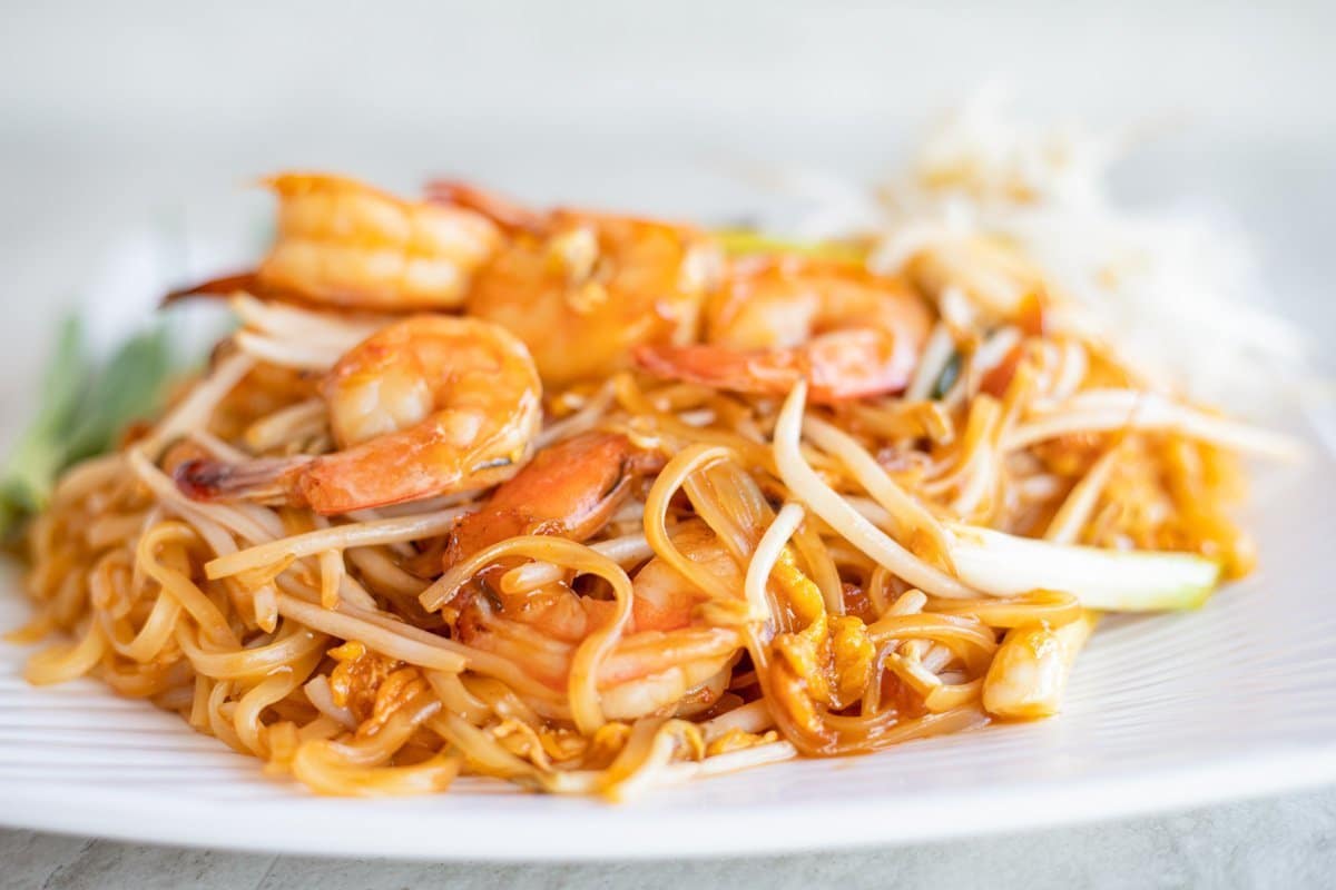 pad thai noodles on a white plate