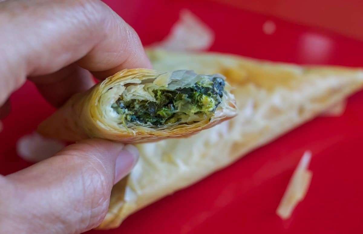 easy spanakopita with bite taken out