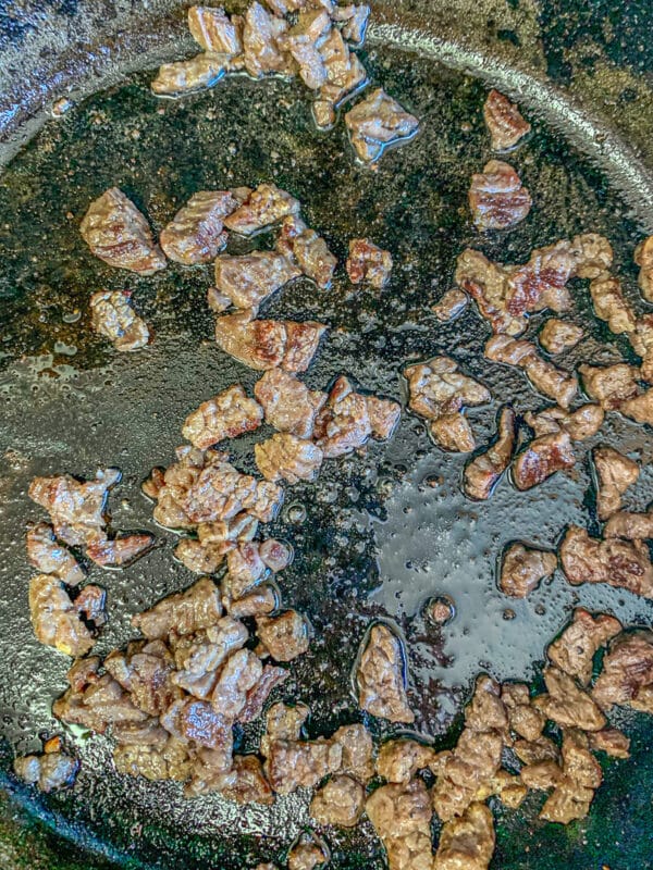 Carne Asada being fried in a pan