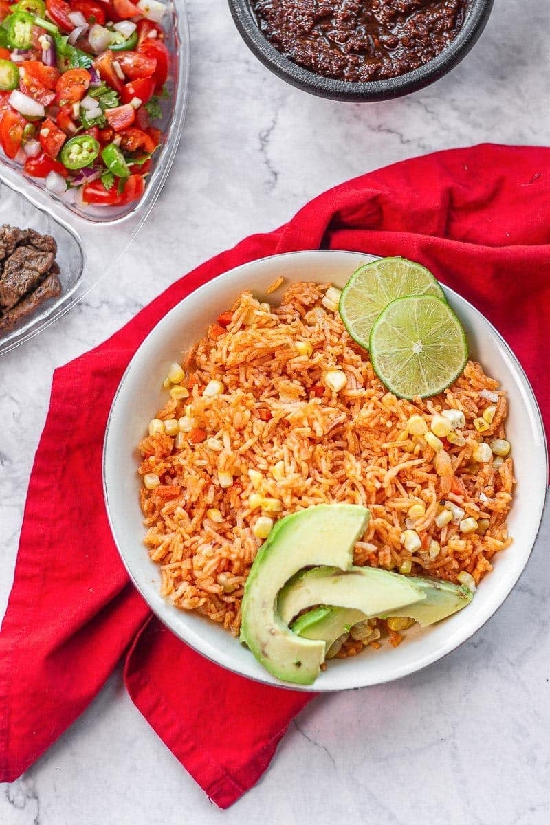 Mexican rice bowl on a red napkin.