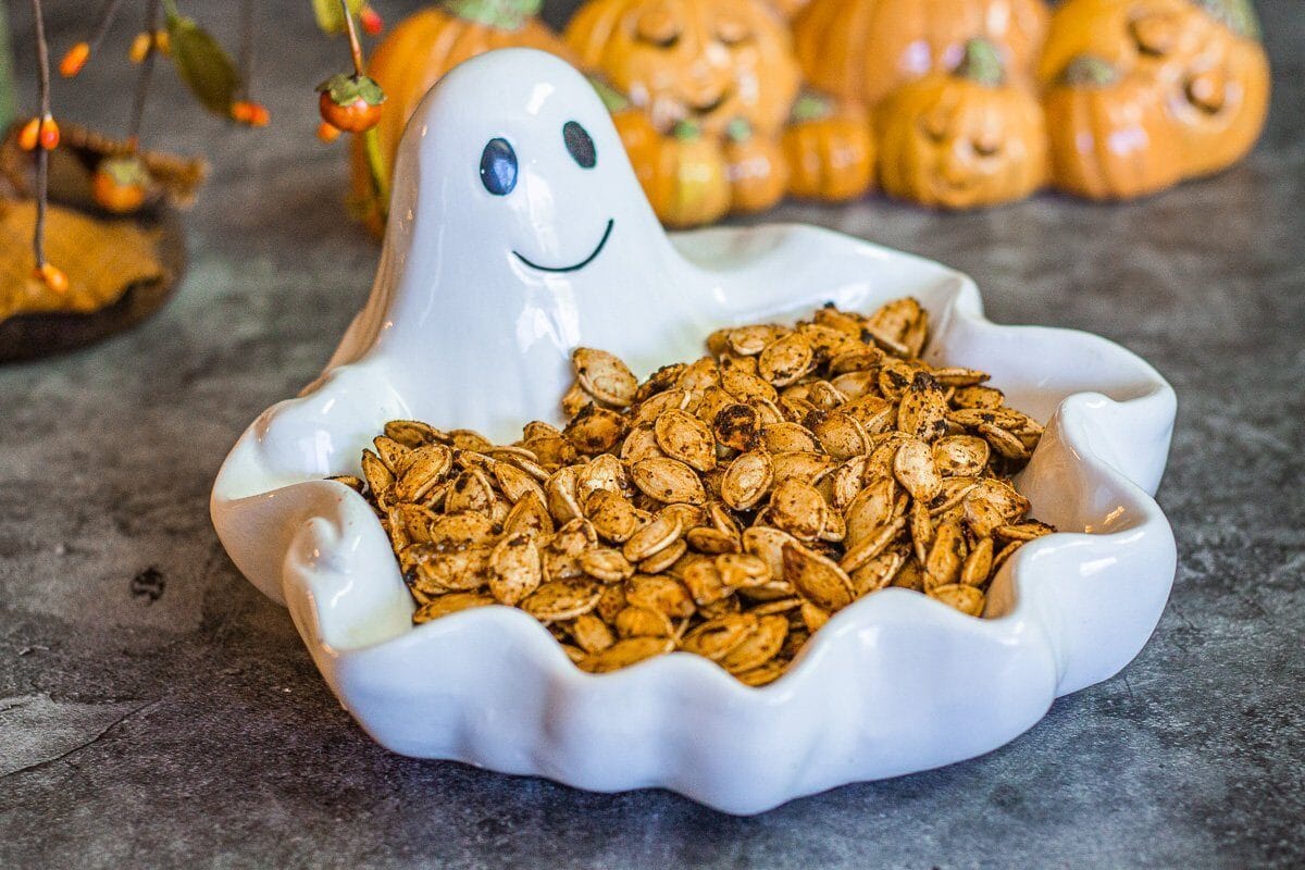 ghost bowl with pumpkin seeds inside