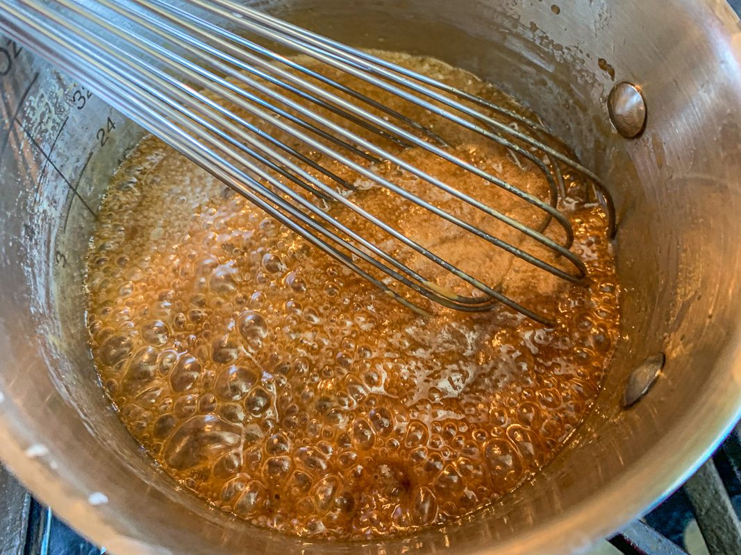 making butterscotch sauce in a pan