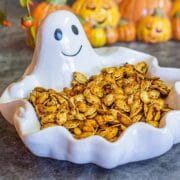 roasted pumpkin seeds in a ghost bowl