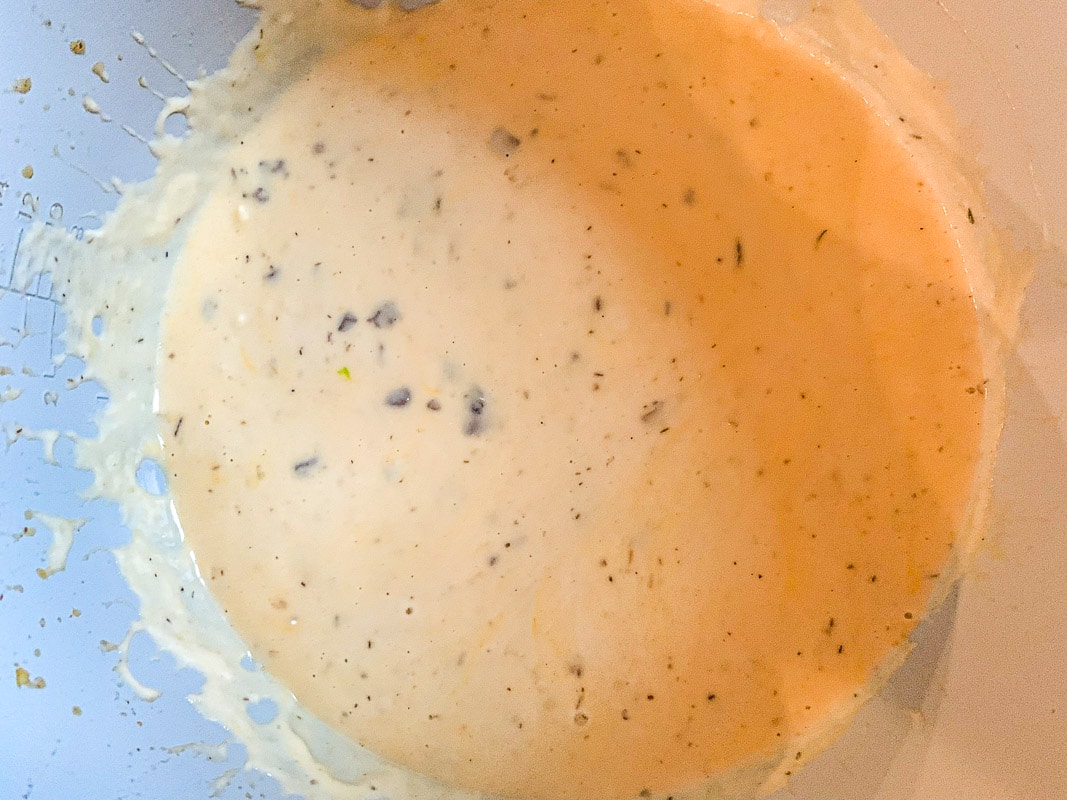 seasoned cheese sauce in a pot