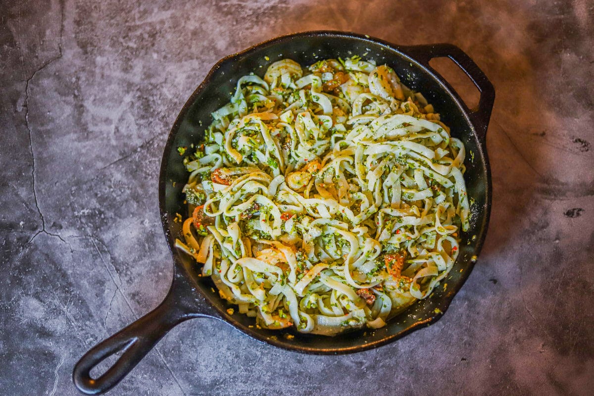 protein noodles with Chimichurri sauce in a skillet