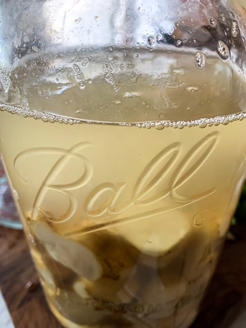 brined sunchokes in a Ball jar.