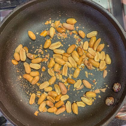 roasting peanuts in a pan