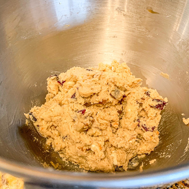 cookie dough in a silver bowl