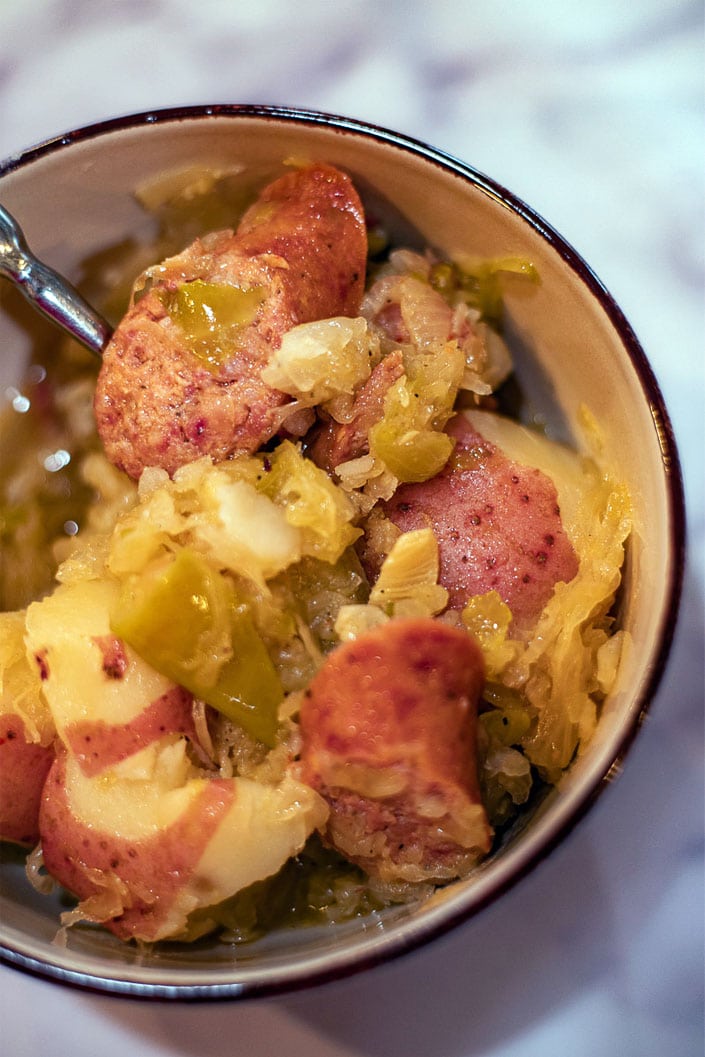 kielbasa and sauerkraut in a bowl