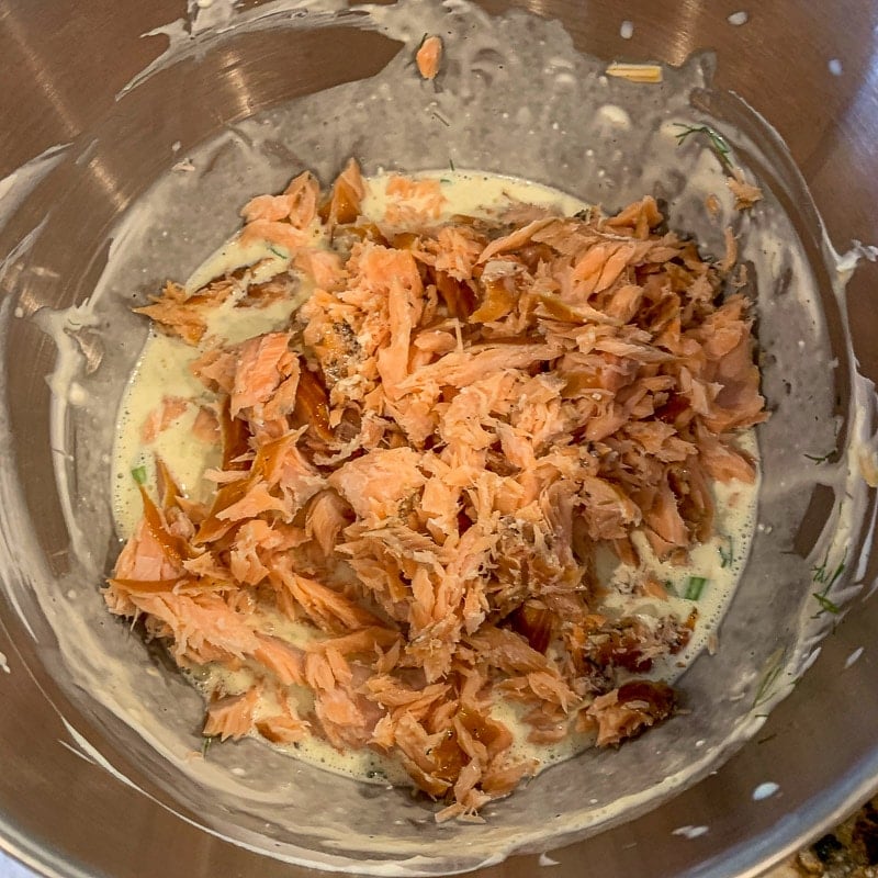 flaked salmon and other pie mix ingredients in a bowl