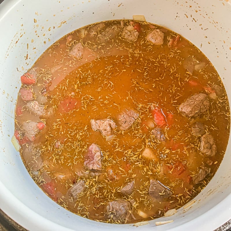 venison stew cooking in a pot