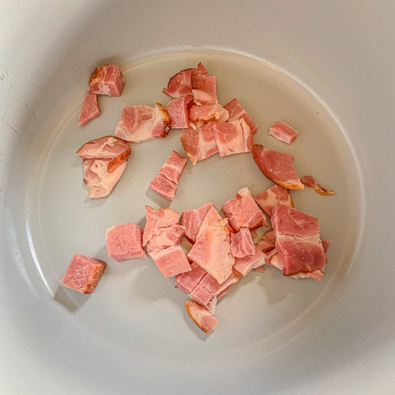 diced bacon in a pot