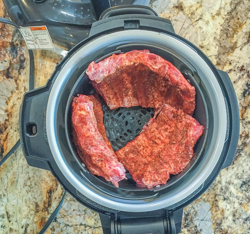 pressure cooker with raw baby back ribs