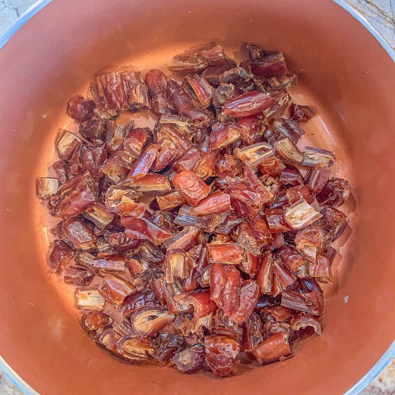 chopped dates in a brown pot