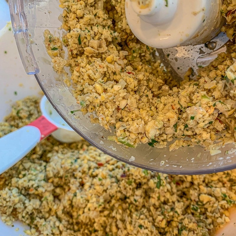 grinding falafel mix in a food processor