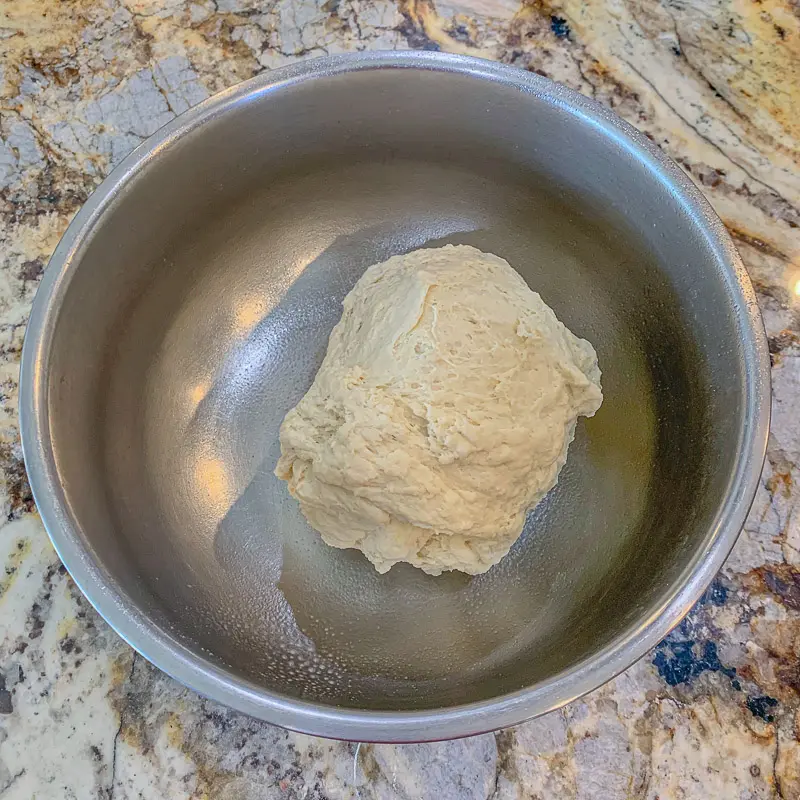 dough in a silver bowl