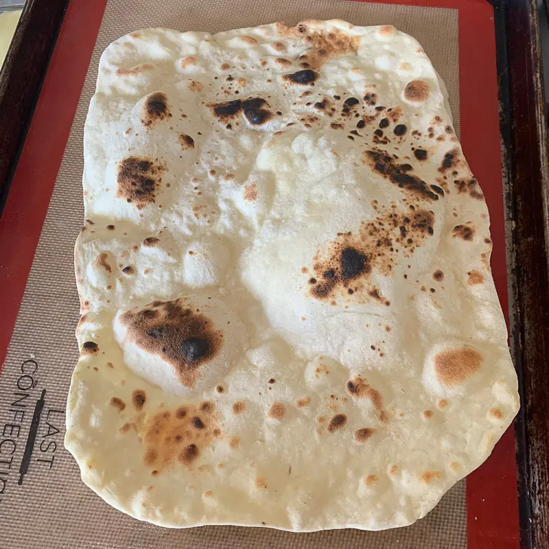 lavash bread on a cookie sheet