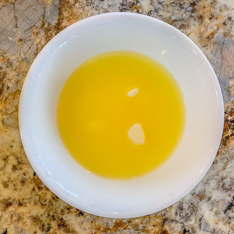 melted butter in a white bowl